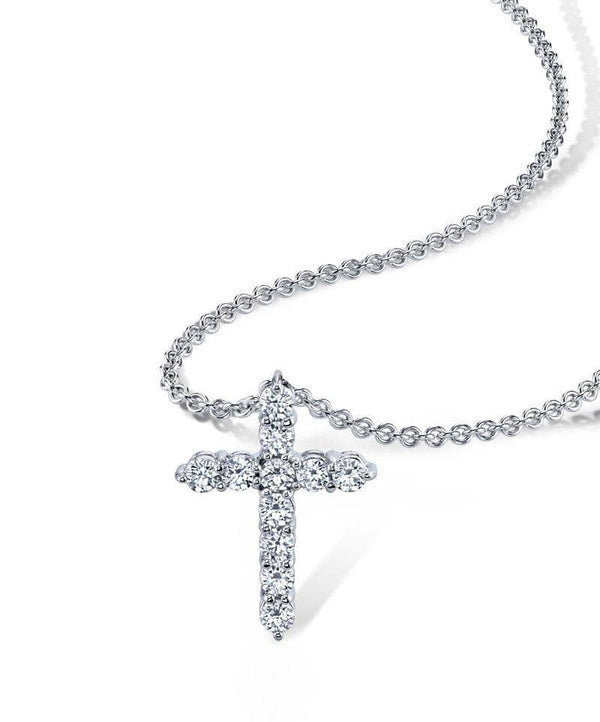Custom made diamond cross featuring .69 carats total weight in diamonds in a platinum setting with a 1.5mm round cable chain adjustable from 16-18