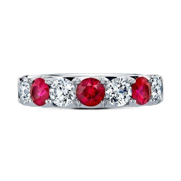 Custom made band featuring 1.42 carats total weight in round rubies and 1.38 carats total weight in round brilliant cut diamonds set in platinum.
