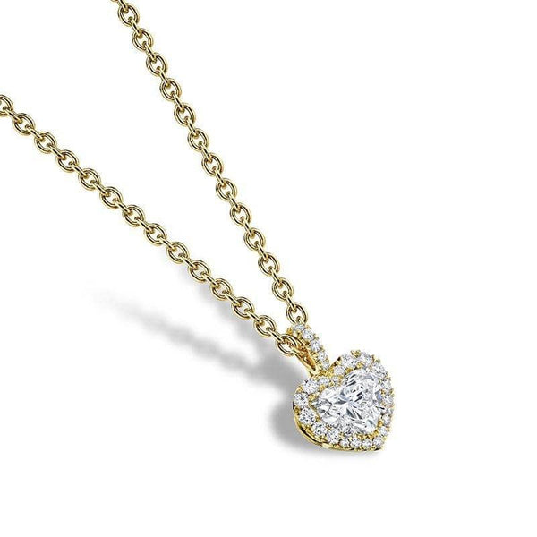 Custom made necklace featuring a .75 carat heart shaped center diamond with .13 carats total weight in round brilliant accent diamonds set in 18k yellow gold with a 1.6mm round cable chain with lobster clasp.