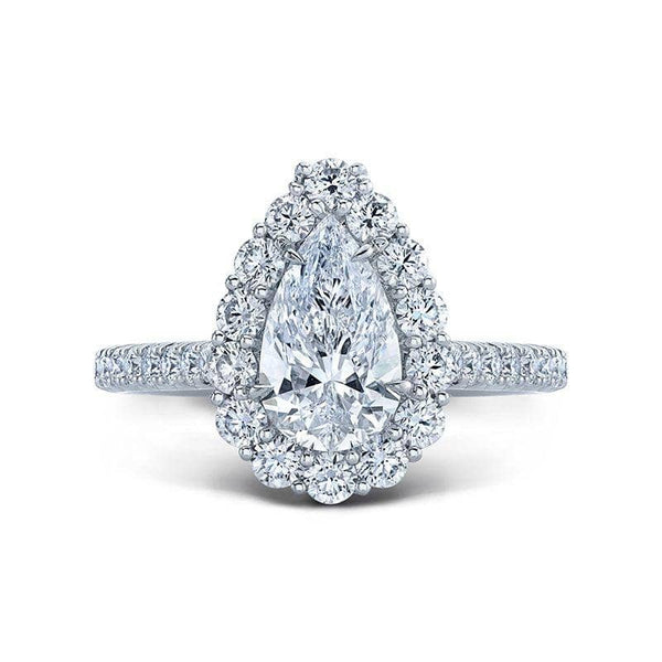 Custom made platinum ring featuring a gorgeous 1.50 ct pear shaped brilliant cut center diamond surrounded by an additional 1.11 carats total weight in accent diamonds.