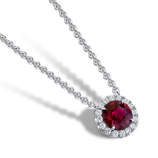 Custom made necklace featuring a 2.00 carat ruby with .24 carats total weight in round brilliant cut diamonds set in platinum with a 16-18