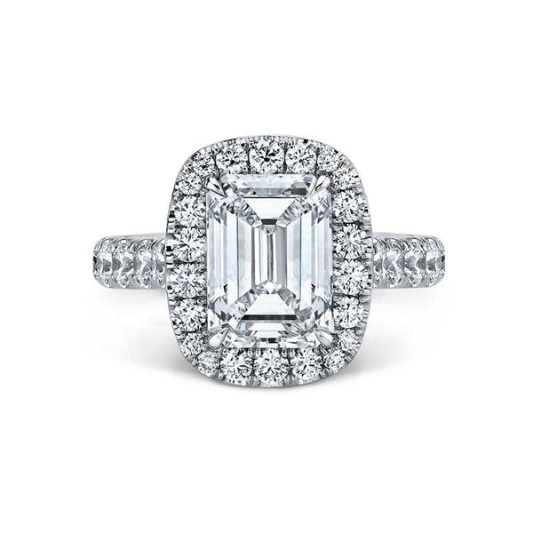 Custom made ring featuring a 3.07 carat emerald cut center diamond with 1.67 carats total weight in round brilliant cut accent diamonds set in platinum.