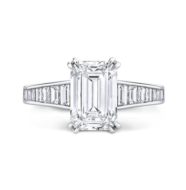 Emerald Cut Diamond RingCustom hand crafted ring featuring a 3.18 carat emerald cut diamond center with .84 carats total weight in baguette cut accent diamonds and .12 carats total round brilliant cut diamonds set in platinum.
