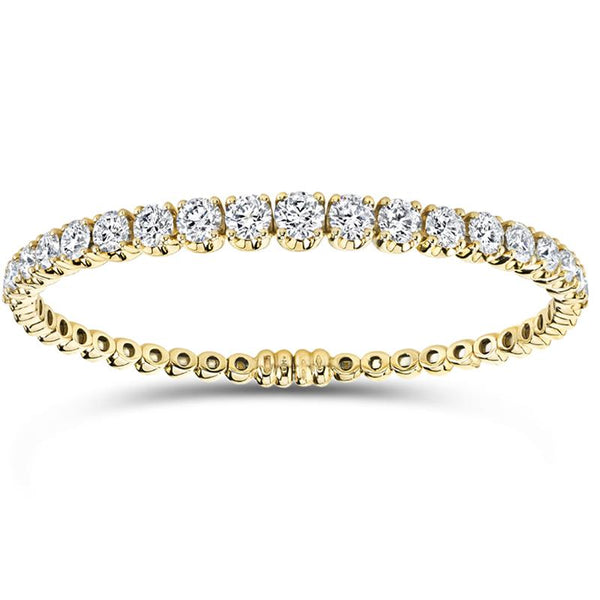 Flexible bangle bracelet featuring 7.00 carats total weight in diamonds with a magnetic closure set in 18k yellow gold.