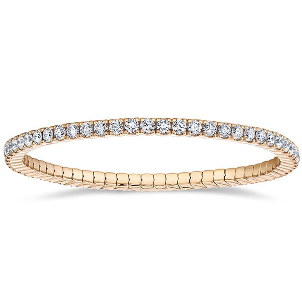 Hand crafted eternity bracelet featuring 5.50 carats total weight in round brilliant cut diamonds set in 18k rose gold.
