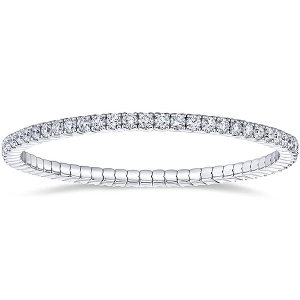 Custom made eternity bracelet featuring 5.50 carats total weight in round brilliant cut diamonds set in 18k white gold.