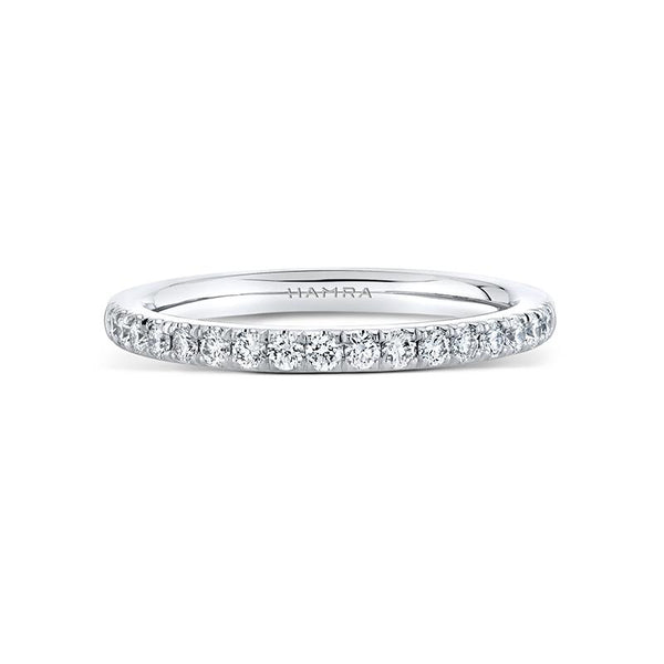 Custom made band featuring .30 carats total weight in round brilliant cut diamonds set in platinum.