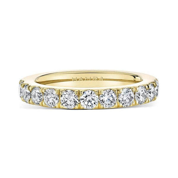 Custom made band featuring 1.10 carats total weight in round brilliant cut diamonds set in 18k yellow gold.