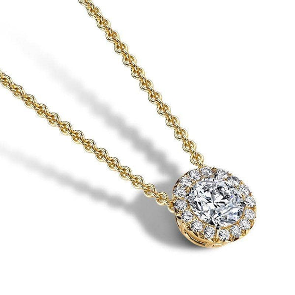 Hand crafted necklace featuring a 1 50 ct. round brilliant cut center diamond with .31 carats total weight in accent diamonds set in 18k yellow gold.
