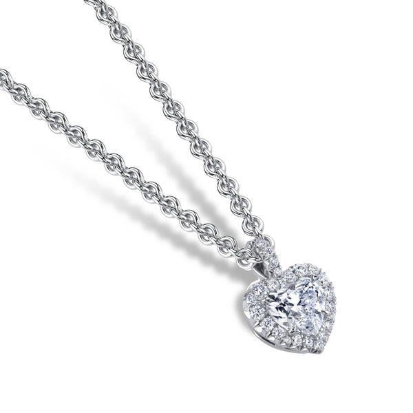 Custom made necklace featuring a .50 carat heart shaped center diamond surrounded by .13 carats total weight in round brilliant cut accent diamonds set in platinum with a 1.5mm round cable cable chain with a lobster clasp.