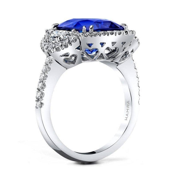 Amazing ring featuring a 7.39 ct. cushion cut sapphire center with .80 carats total weight in half moon diamonds and .61 carats total in round brilliant cut accent diamonds set in platinum.