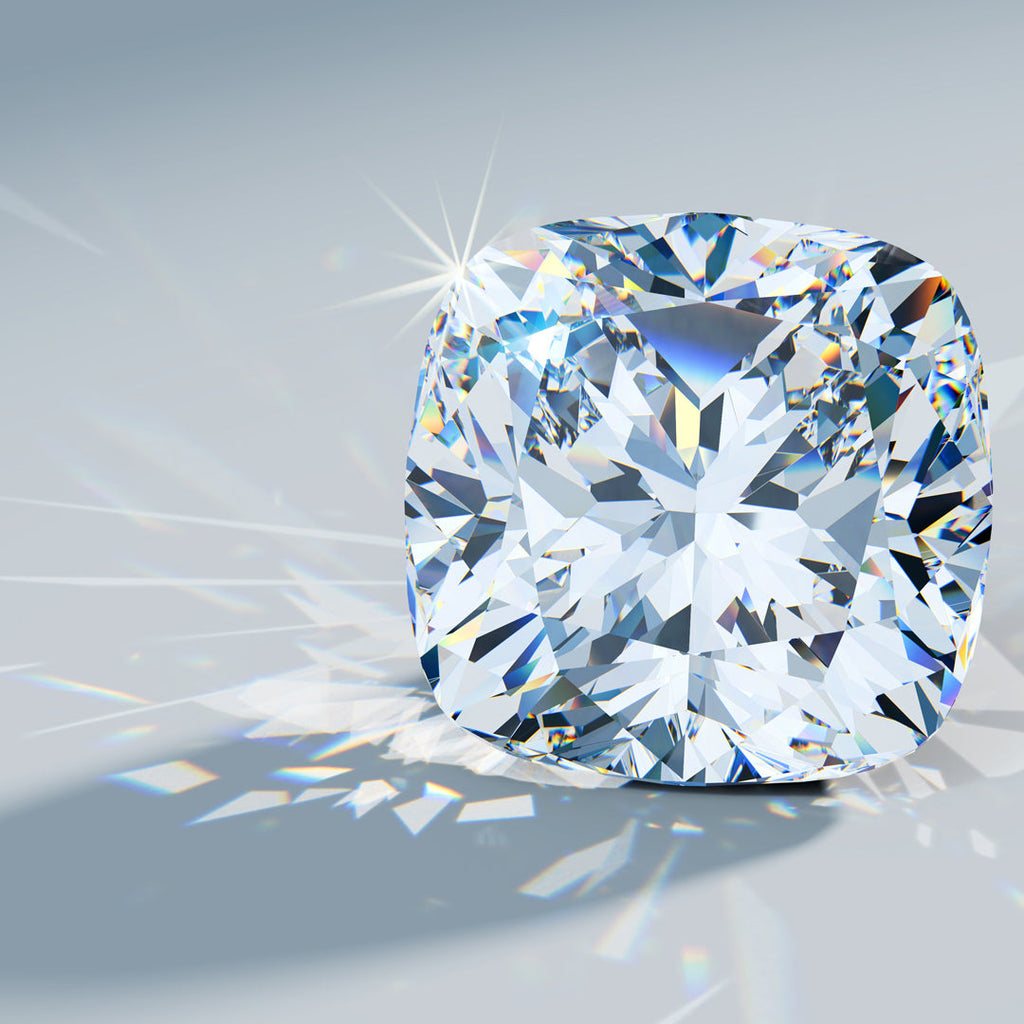 Loose cushion cut diamond on grey background