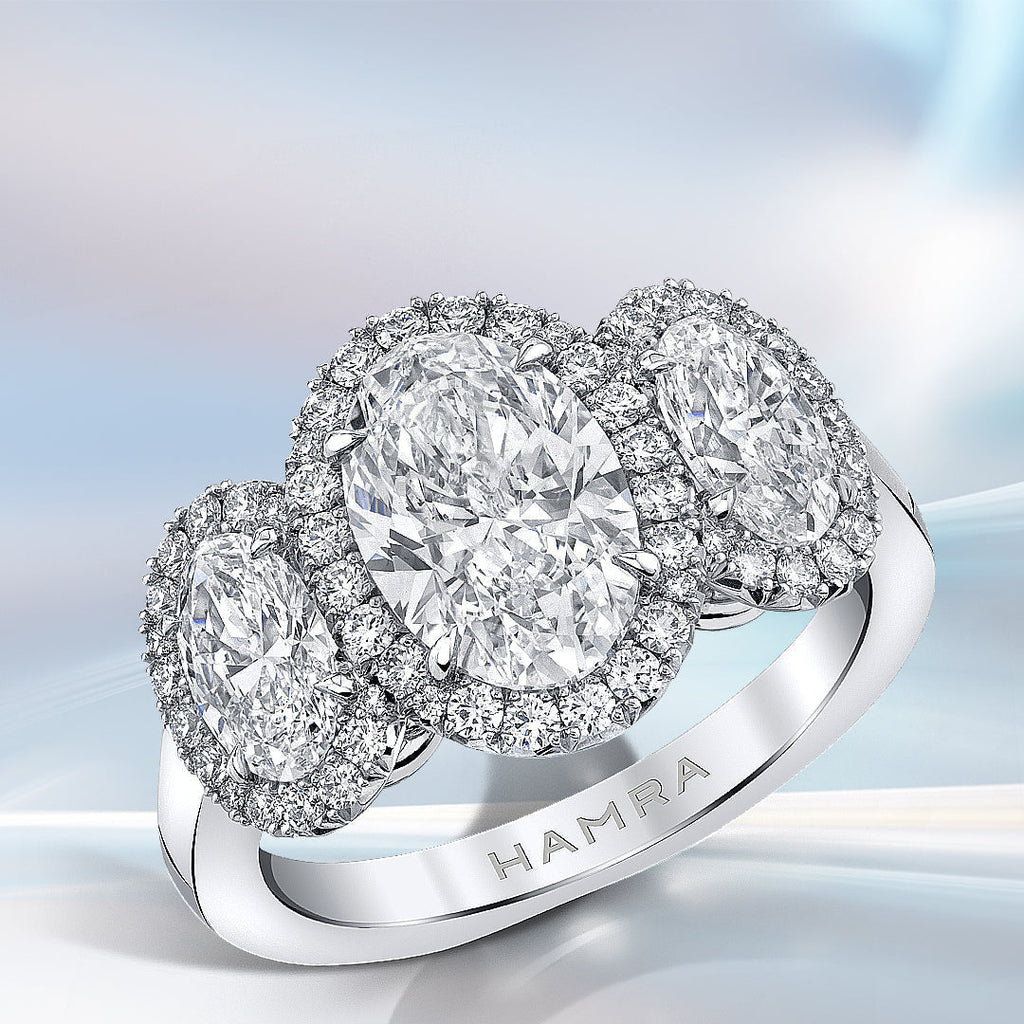 Three stone oval diamond ring
