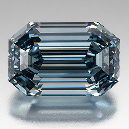 close up of a blue emerald cut diamond