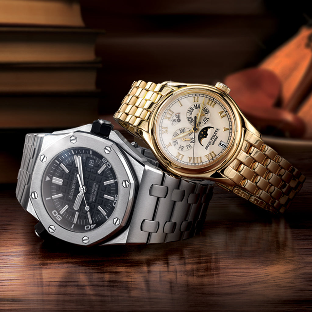 Two luxury watches in stainless steel and yellow gold.