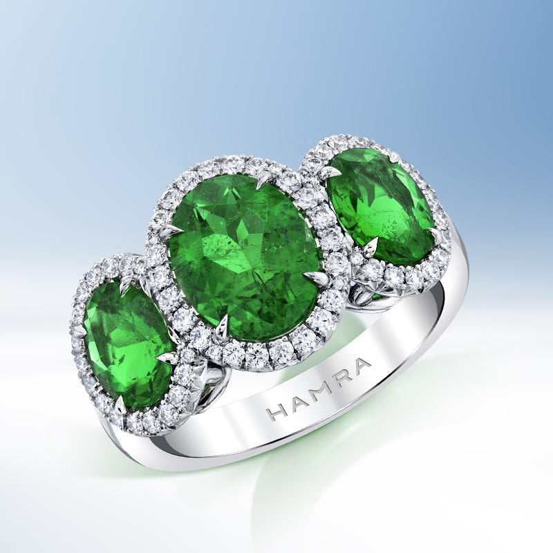 ring with three emeralds and diamonds