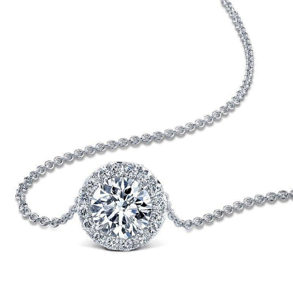 Hand crafted necklace featuring a 3.01 carat round brilliant cut diamond center stone surrounded by .44 carats total weight in accent diamonds set in platinum.