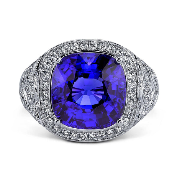 Custom made ring featuring an 8.06 carat modified cushion cut tanzanite center stone with 1.29 carats total weight in accent diamonds set in 18k white gold.
