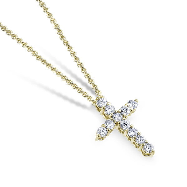Custom made cross necklace featuring .64 carats total weight in round brilliant cut diamonds set in 18k yellow gold with a 1.5mm round cable chain adjustable from 16