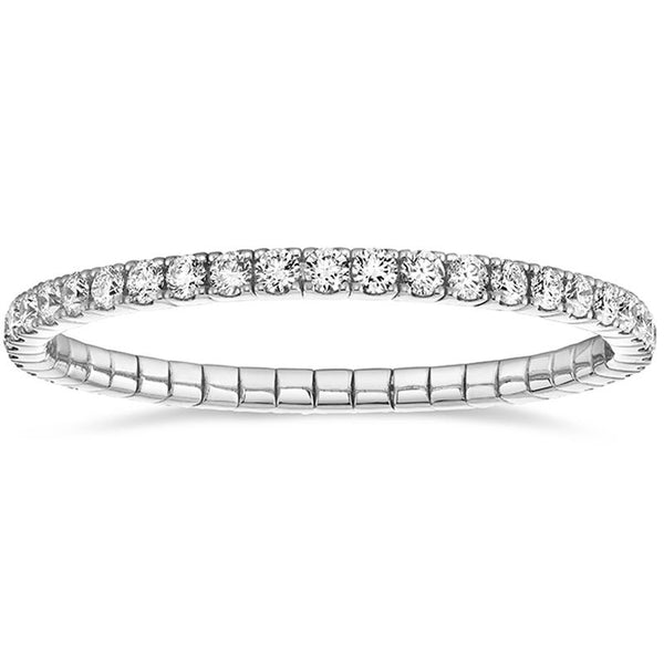 Custom made eternity bracelet featuring 11.12 carats total weight in round brilliant cut diamonds set in 18k white gold.