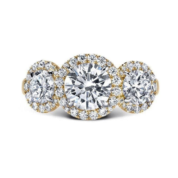 Custom made ring featuring a 1.10 carat round brilliant cut center diamond with .87 carats total weight in round brilliant cut side diamonds and .35 carats total in round brilliant accent diamonds set in 18k yellow gold.