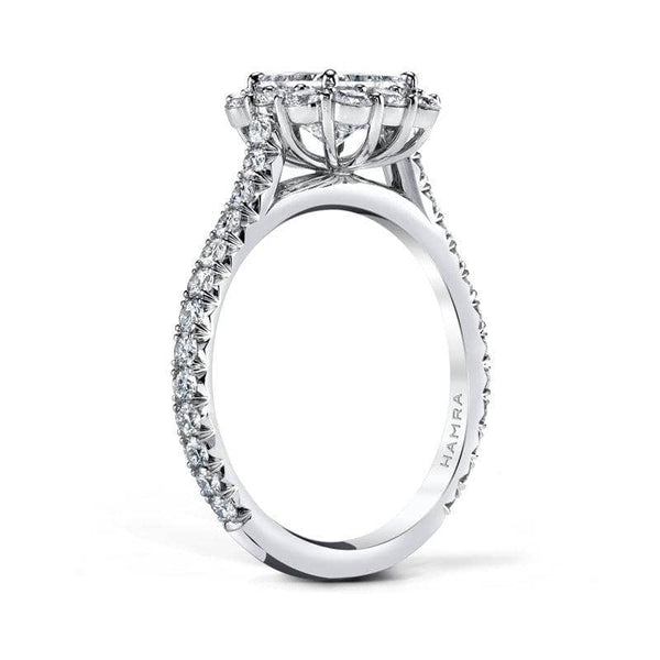 Custom hand made ring featuring a 1.00 carat princess cut diamond with .99 carats total weight in round brilliant cut accent diamonds set in platinum.
