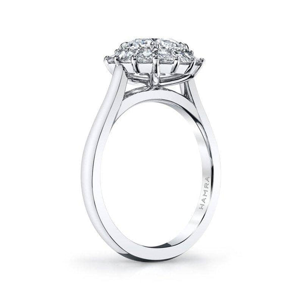 Custom hand crafted ring featuring a 1.50 carat round brilliant cut center diamond with .91 carats total weight in an asscher cut diamond halo set in platinum.