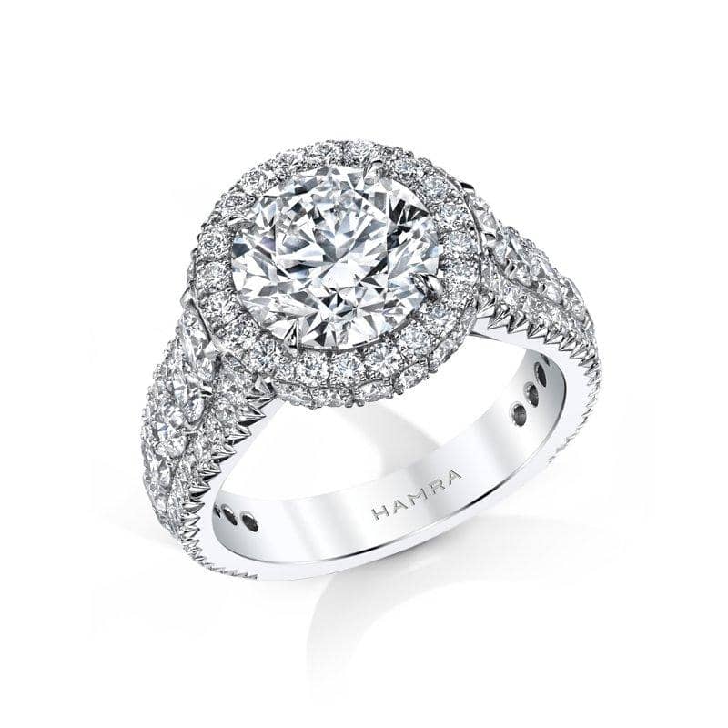 Custom made ring featuring a 3.00 carat round brilliant cut center diamond with 2.36 carats total weight in round brilliant cut diamond accents set in platinum.