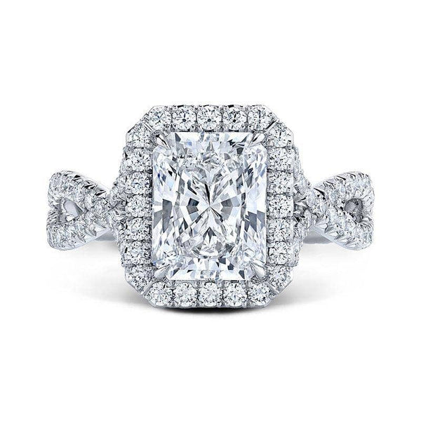 Hand crafted ring featuring a 2.01 carat radiant cut center diamond with .73 carats total weight in round brilliant cut accent diamonds set in platinum.