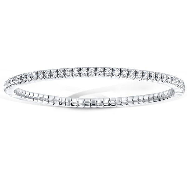 Hand crafted eternity bracelet featuring 3.00 carats total weight in round brilliant cut diamonds set in 18k white gold.