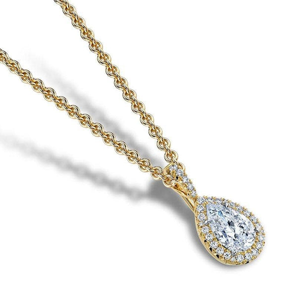 Custom made necklace featuring a 1.00 carat pear shaped center diamond with .15 carats total weight in accent diamonds set in 18k yellow gold with a 16