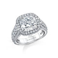 Handcrafted custom ring featuring a 5.00 carat cushion cut diamond center with 2.21 carats total weight in round brilliant cut diamonds set in platinum.