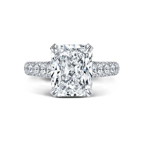 Custom hand crafted ring featuring a 5.00 carat radiant cut diamond center with 1.68 carats total weight in round brilliant cut diamonds set in platinum.