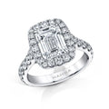 Custom made ring featuring a 4.02 carat emerald cut center diamond with 1.79 carats total weight in round brilliant cut diamonds set in platinum.