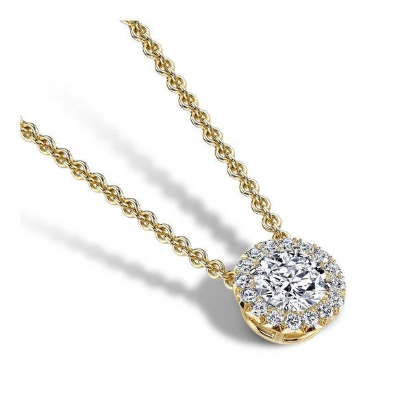 Custom made necklace featuring a .50 carat round brilliant cut center diamond with .21 carats total weight in round brilliant cut diamond accents set in 18k yellow gold.