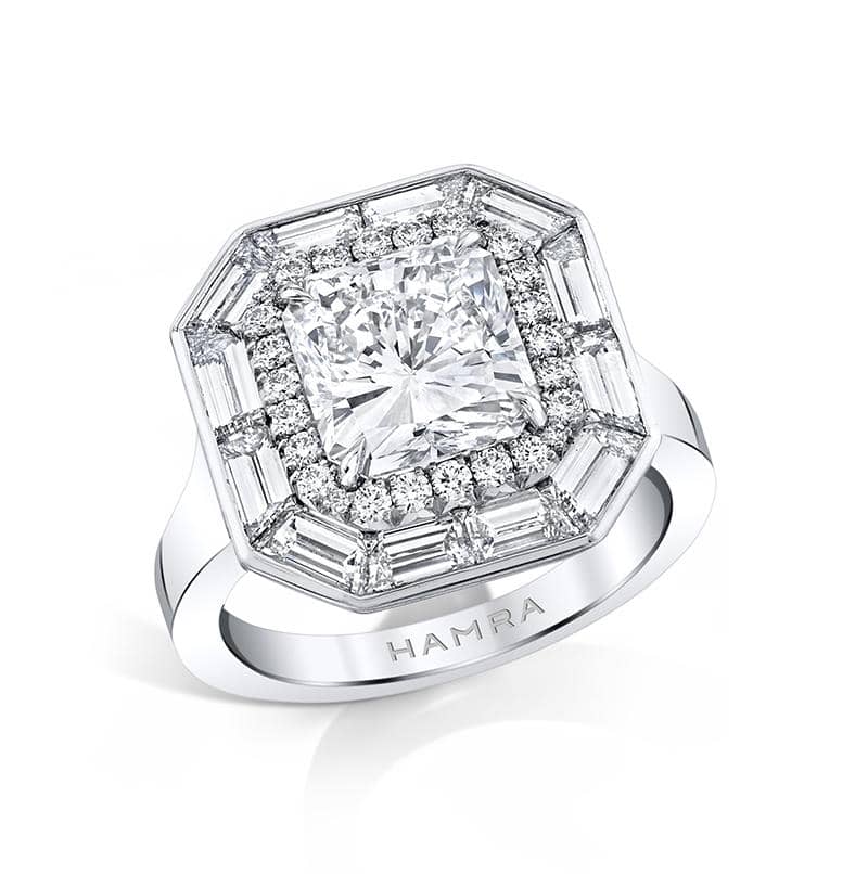 Hand crafted ring featuring a 3.03 carat radiant cut center diamond with 1.73 carats total weight in baguette cut diamonds and .46 carats total in round brilliant cut diamond accents set in platinum.