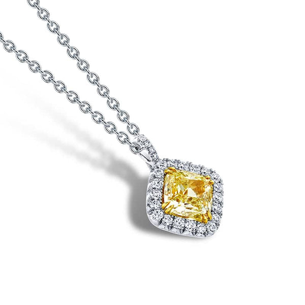 Custom hand-crafted necklace featuring a 3.51 carat cushion cut fancy yellow diamond center with a halo of .48 carats total weight in round brilliant cut diamond set in platinum and 18k yellow gold including a 16 - 18
