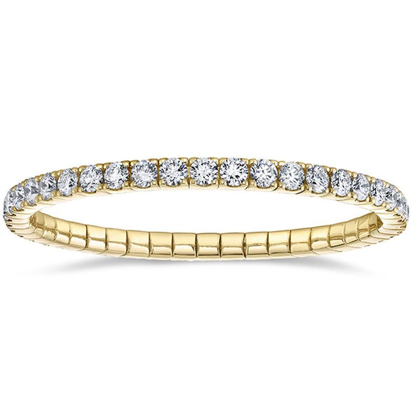 Custom made eternity bracelet featuring 11.28 carats total weight in round brilliant cut diamonds set in 18k yellow gold.
