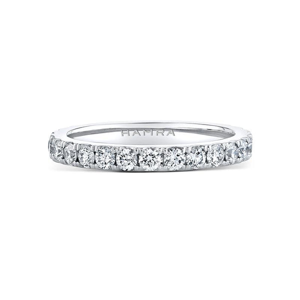 Custom made eternity band featuring 1.10 carats total weight in round brilliant cut diamonds set in platinum.