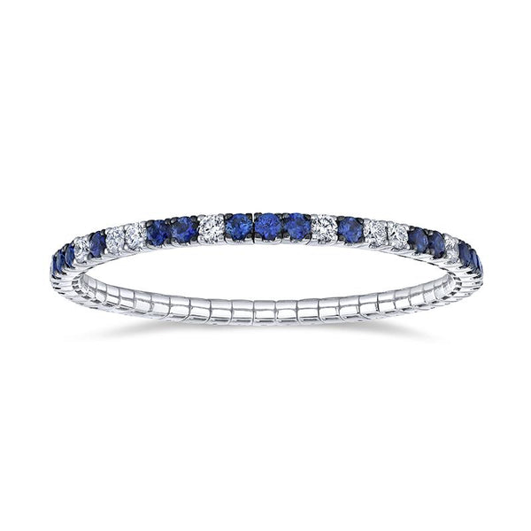 Custom made eternity bracelet featuring 6.25 carats total weight in sapphires and 3.40 carats total in round brilliant cut diamonds set in 18k white gold.