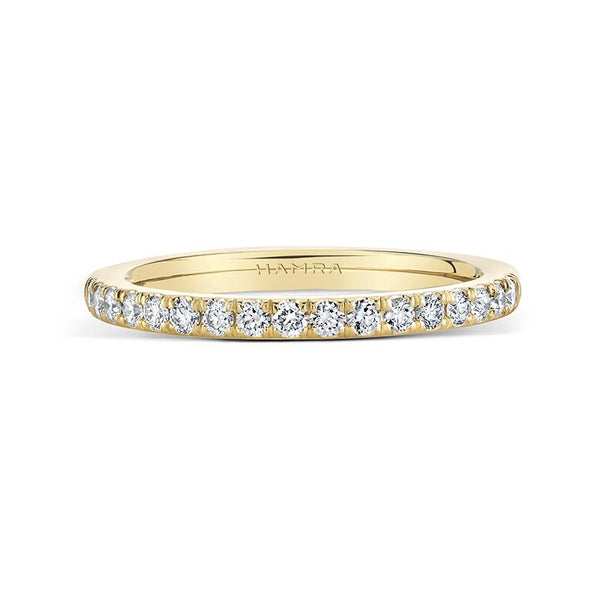 Custom made band featuring .30 carats total weight in round brilliant cut diamonds set in 18k yellow gold.