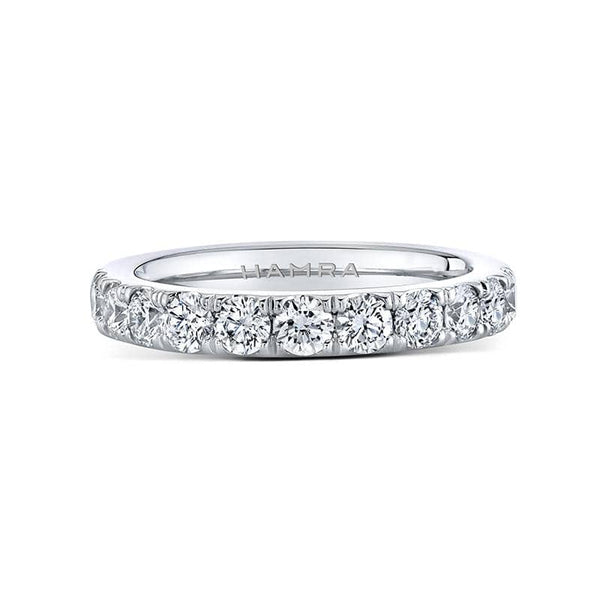Custom made band featuring 1.10 carats total weight in round brilliant cut diamonds set in platinum.