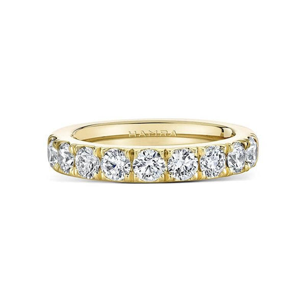 Custom made band featuring 1.30 carats total weight in round brilliant cut diamonds set in 18k yellow gold.