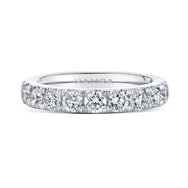 Custom made band featuring 1.30 carats total weight in round brilliant cut diamonds set in platinum.
