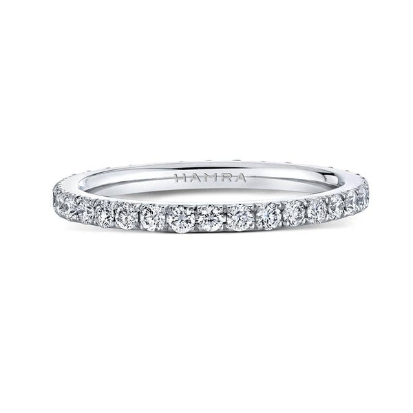 Custom made eternity band featuring .65 carats total weight in round brilliant cut diamonds set in platinum.