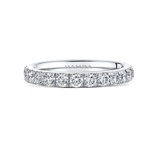 Custom made eternity band featuring 1.65 carats total weight in round brilliant cut diamonds set in platinum.