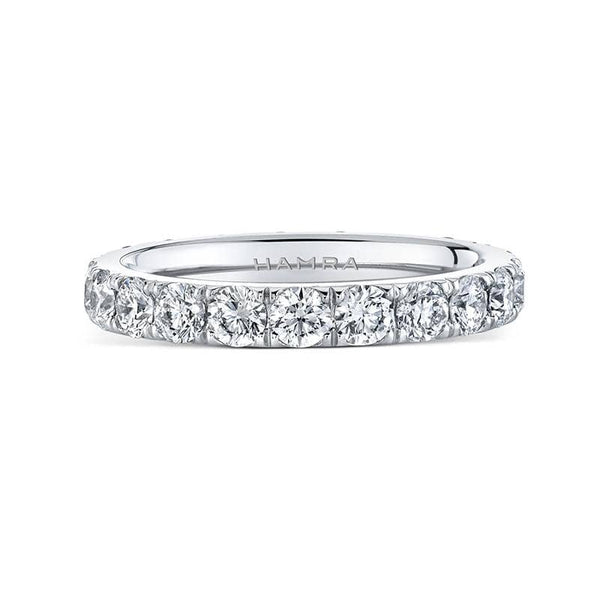 Custom made eternity band featuring 2.10 carats total weight in round brilliant cut diamonds set in platinum.