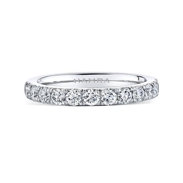 Custom made band featuring .82 carats total weight in round brilliant cut diamonds set in platinum.