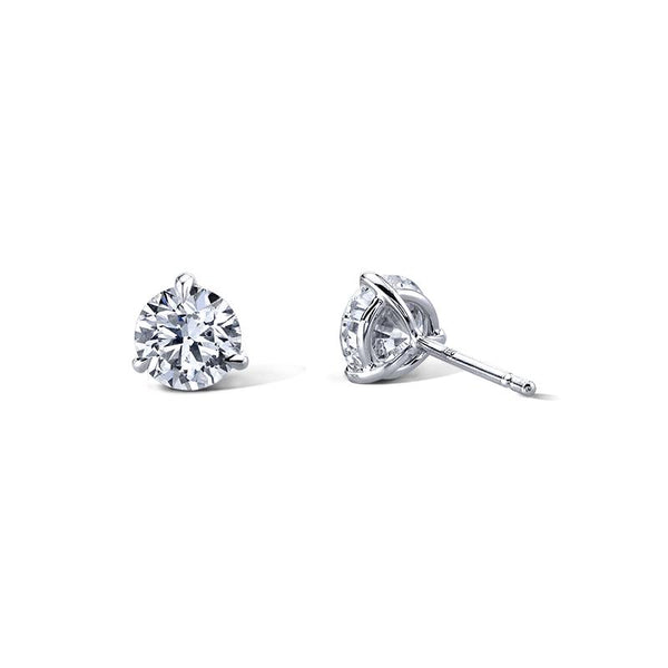 Diamond stud earrings featuring 1.80 carats total weight in round brilliant cut diamonds set in 18k white gold.
