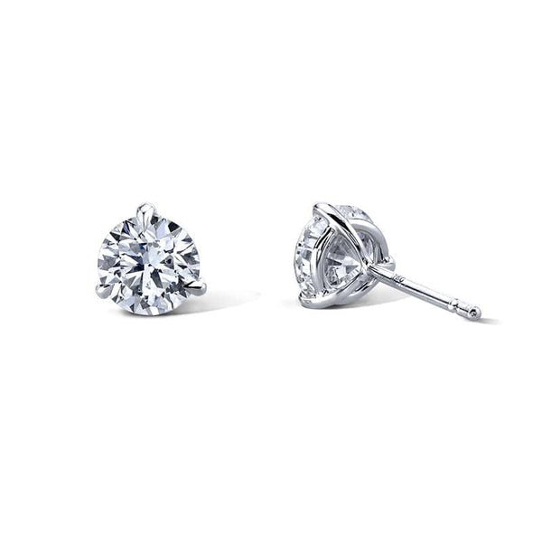 Stud earrings featuring 1.28 carats total weight in round brilliant cut diamonds set in platinum.